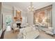 Bright formal living room with a decorative fireplace, elegant furnishings, and natural lighting at 172 Tradd St, Charleston, SC 29401