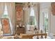 Bright formal living room featuring stylish furniture, decor, and a crystal chandelier at 172 Tradd St, Charleston, SC 29401