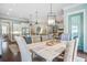 Open dining area adjacent to kitchen and living room, featuring stylish decor at 1776 W Canning Dr, Mount Pleasant, SC 29466