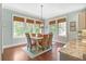 Bright dining area featuring large windows and a stylish chandelier at 1776 W Canning Dr, Mount Pleasant, SC 29466