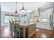 Spacious kitchen featuring a large island with bar seating and modern appliances at 1776 W Canning Dr, Mount Pleasant, SC 29466
