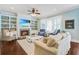 Cozy living room with built-in shelving, a fireplace, and comfortable seating at 1776 W Canning Dr, Mount Pleasant, SC 29466