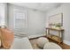 Cozy bedroom with neutral colors, stylish furniture, and plenty of natural light at 1790 Brockington Ave, Charleston, SC 29407