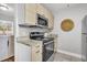 Well-equipped kitchen with stainless steel appliances, granite countertops, and ample cabinet space at 1790 Brockington Ave, Charleston, SC 29407