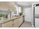 Modern kitchen featuring light wood cabinets, stainless steel appliances, and granite countertops at 1790 Brockington Ave, Charleston, SC 29407