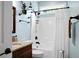 Cozy bathroom with granite countertop, shower-tub combo, and elegant fixtures; well-lit with stylish accents at 184 Angora Way, Summerville, SC 29485