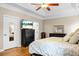 Bedroom with a ceiling fan and a dresser with a tv with an image of a beach scene on the screen at 184 Angora Way, Summerville, SC 29485