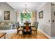 Elegant dining room with a chandelier and views of the backyard at 184 Angora Way, Summerville, SC 29485