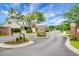 Gated community entrance with lush landscaping and brick signage, ensuring privacy and exclusivity at 184 Angora Way, Summerville, SC 29485