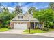 Beautiful brick home with two-car garage, and well-manicured lawn; American flag, too at 184 Angora Way, Summerville, SC 29485