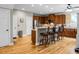 Open kitchen with granite countertops, stainless steel appliances, and bar seating at 184 Angora Way, Summerville, SC 29485