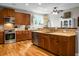 Beautiful kitchen featuring stainless steel appliances, granite counters and warm cabinetry at 184 Angora Way, Summerville, SC 29485