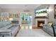 Bright living room with a fireplace and a comfortable seating area at 184 Angora Way, Summerville, SC 29485