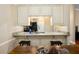 A charming kitchen includes an eat-in bar, granite countertops, and modern fixtures for functionality and style at 188 Midland Parkway # 110, Summerville, SC 29485
