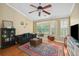 The inviting living room boasts a large window, hardwood floors, and comfortable seating arrangement at 188 Midland Parkway # 110, Summerville, SC 29485