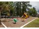 Community playground with swings, slides, and play structures for enjoyment at 188 Midland Parkway # 110, Summerville, SC 29485