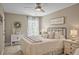 Cozy bedroom with a queen bed, soft decor, and natural lighting at 1985 Shields Ln, Mount Pleasant, SC 29466