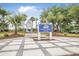 Welcoming Swim and Tennis Center entrance with lush landscaping and a charming architectural style at 1985 Shields Ln, Mount Pleasant, SC 29466