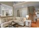 Open living space with comfortable seating, a view of the second floor, and easy access to kitchen at 1985 Shields Ln, Mount Pleasant, SC 29466
