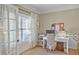 Bright office space with natural light, a comfortable chair, and ample storage solutions at 1985 Shields Ln, Mount Pleasant, SC 29466