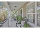 Inviting porch features comfortable seating and charming decor, providing a cozy outdoor living space at 1985 Shields Ln, Mount Pleasant, SC 29466