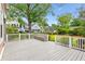 Inviting back deck with built-in seating, perfect for entertaining guests or enjoying a quiet evening outdoors at 2017 Woodland Shores Rd, Charleston, SC 29412