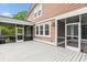 Inviting back porch with screen doors and plenty of natural light, a perfect spot for outdoor relaxation at 2017 Woodland Shores Rd, Charleston, SC 29412