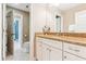 Bathroom with granite countertops, white cabinets, and toilet with additional room entrance visible at 2017 Woodland Shores Rd, Charleston, SC 29412