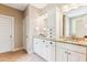 Bathroom with white cabinets, granite counters, double sinks, and white cabinets at 2017 Woodland Shores Rd, Charleston, SC 29412