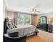 Serene bedroom with a lake view, featuring soft colors, comfortable furniture, and natural light at 2017 Woodland Shores Rd, Charleston, SC 29412