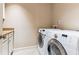 Functional laundry room featuring a front load washer and dryer for easy chore days at 2017 Woodland Shores Rd, Charleston, SC 29412