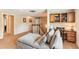 Comfortable living room features a chaise lounge, built-in desk and staircase access at 2017 Woodland Shores Rd, Charleston, SC 29412