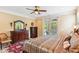 Spacious main bedroom with a ceiling fan and access to an outdoor porch at 2017 Woodland Shores Rd, Charleston, SC 29412