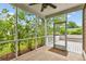 Cozy screened porch with tiled floor and natural light, a perfect retreat for outdoor living and relaxation at 2017 Woodland Shores Rd, Charleston, SC 29412