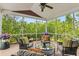 Relaxing screened porch with comfortable seating and stylish decor, creating an inviting outdoor living space at 2017 Woodland Shores Rd, Charleston, SC 29412
