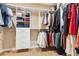 Organized walk-in closet featuring shelving and hanging rods for ample storage space at 2017 Woodland Shores Rd, Charleston, SC 29412