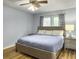 Cozy bedroom features wood-look floors, a window, and a comfortable bed with side tables at 206 Challis Ct, Goose Creek, SC 29445
