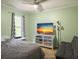 Inviting bedroom featuring comfortable furnishings, a window, and a modern TV on a dresser at 206 Challis Ct, Goose Creek, SC 29445