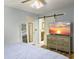 Comfortable bedroom showcasing wood-look floors and a sleek TV on a modern dresser at 206 Challis Ct, Goose Creek, SC 29445