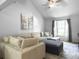 Bright living room with vaulted ceilings, large sectional sofa, and natural light from a nearby window at 206 Challis Ct, Goose Creek, SC 29445