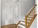 Wooden staircase with white walls and hardwood floors leading to the second floor at 206 Challis Ct, Goose Creek, SC 29445