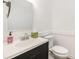 Cozy half bathroom with a clean vanity and fixtures, designed for guest convenience at 21 Rivers Point Row # 3C, Charleston, SC 29412