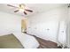 This cozy bedroom features wood-look floors, white walls, and two closets at 21 Rivers Point Row # 3C, Charleston, SC 29412