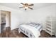 This bedroom features wood-look floors, white walls, and built-in shelving at 21 Rivers Point Row # 3C, Charleston, SC 29412