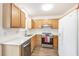 This functional kitchen has light wood cabinets, stainless appliances, and ample counter space at 21 Rivers Point Row # 3C, Charleston, SC 29412