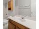 Bathroom featuring wood cabinets, tile flooring, and a tub with shower at 217 Smithfield Ave, Summerville, SC 29485