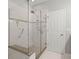 Beautiful bathroom with tiled shower, glass doors, and safety features at 217 Smithfield Ave, Summerville, SC 29485