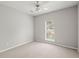 Bedroom with neutral carpet and a large window, offering a peaceful retreat at 217 Smithfield Ave, Summerville, SC 29485