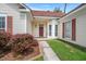 Inviting front entry showcasing a well-maintained walkway and charming curb appeal at 217 Smithfield Ave, Summerville, SC 29485