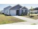 Charming single-Gathering home with a well-manicured lawn and a cozy front porch at 224 Coral Sunset Way, Summerville, SC 29486